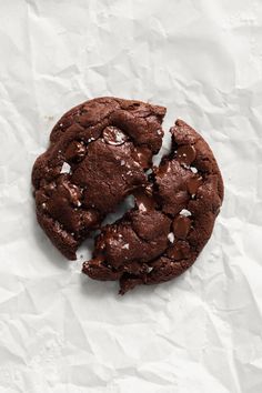 a chocolate cookie that has been cut in half