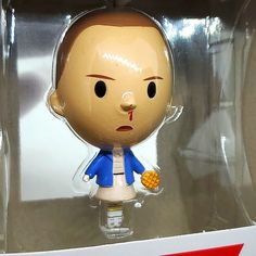 an action figure in a plastic case with a surprised look on his face and nose