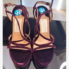 Brand New Salvatore Ferragamo Burgundy/Plum Embroidery Velvet Sandals. Never Wore. Sleek Gold Buckle Along The Back And Burgundy Velvet In Front. Very Beautiful And Finessed Embroidery Detail Among The Heels. The Original Price Is Very Expensive S775, And Two Sizes Are Available. Size 6c Has A Wider Sole Than Size 6b. B Is The Standard Sole Size In The Us. I Got Them From The. Nordstrom Rack, No Dust Bag, And Original Shoe Box, But I Will Ship It With A Very Good Quality Shoe Box. Formal Burgundy Ankle Strap Sandals, Elegant Burgundy Sandals For Party, Elegant Purple Block Heel Sandals, Elegant Purple Sandals With Round Toe, Elegant Purple Sandals With Branded Heel, Designer Purple Sandals For Formal Occasions, Plum Embroidery, Black Espadrilles Wedges, Velvet Sandals