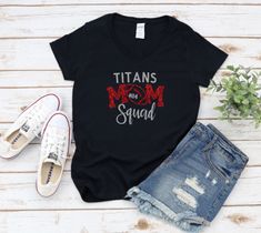 Customized Titans Mom Squad Glitter Tee. Available on unisex tee or women's v-neck. Include players number in notes at checkout. Care Instructions: Turn the shirt inside out. Machine wash cold. No bleach, no fabric softener. Air dry for the best care. Do not iron on the image. We pride ourselves on creating custom products for you using high-quality apparel, screen print or heat transfer materials, and professional equipment. If you have any questions, please send a message and I will get back t Glitter Tee, Science Club, Swim Team, Custom Products, Fabric Softener, Kids Sweatshirt, Screen Print, Air Dry, Heat Transfer