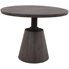 a round wooden table with an iron base