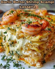 garlic butter shrimp scampi lasagna on a white plate