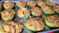 there are many stuffed green peppers in the pan