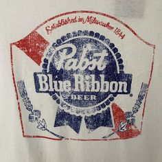 Are You A Lover Of Pabst Blue Ribbon Beer? Show Some Brand Loyalty By Snagging Up This Sleek White Pabst Logo Graphic T Shirt! See Photo For Measurements Blue Collar Aesthetic, Cowgirl Era, Vampire Wedding, Pabst Blue Ribbon Beer, French New Wave, Beer Logo, Pabst Blue Ribbon, Beer Brands, Brand Loyalty