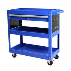 a blue workbench with two shelves on wheels