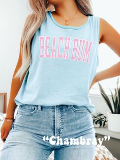 The ultimate Beach Tank Top, this cute and preppy Beach Bum Tank Top is super comfy! Comfort Colors® Tank Tops make the perfect Beach Cover Up! Perfect for Summer or Beachy Vacation! Size up for an Oversized look! ♥ Hello and Welcome to Meaningful Tees Shop! ♥ All of our items are made one at a time with care for each customer : ) ♥ Please allow 5-7 BUSINESS days for your item to be created PLUS shipping time via USPS ♥ UNISEX TANK TOPS fit like a Mens on Women, but are not overly large. ♥ For a Casual Spring Tops For Weekend Getaway, Sleeveless Beach Tops With Letter Print, Sleeveless Letter Print Tops For Vacation, Casual Cotton Tops For Weekend Getaway, Cute Beach Tops For Vacation, Blue Tops For Loungewear During Beach Season, Beachy Cotton Tops For Loungewear, Summer Tops For Vacation Loungewear, Sporty Blue Tops For Vacation