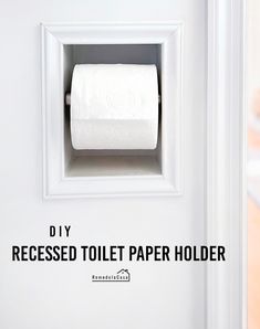 a roll of toilet paper hanging on the wall next to a door with text that reads diy recessed toilet paper holder