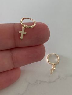 14K Gold Cross Huggie Earrings, Everyday Earrings, Gold Earrings, 14K Yellow Gold Hoops, 14K One Loop Hoops, JLO Hoops, Tiny Huggies, Hanging Cross Hoops, Huggie Earrings The 14K Gold Cross Hoops are beautiful. They are great for everyday wear. Available in yellow 14K gold. These earrings can be worn in combination of any other of our earring styles. A great idea for Valentine's Day, Mother's Day, Anniversaries and Christmas.♦ Materials: 14K Solid Gold♦ Available colors: Yellow Gold♦ Huggie Meas Earring Styles, Earrings Everyday, Christmas Material, Gold Disc, Solid Gold Earrings, Huggie Earrings, Gold Cross, Everyday Earrings, Dainty Earrings