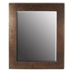 a wooden frame mirror with a square shaped design on the front and bottom edge,