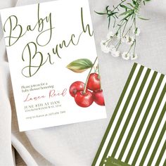 the baby brunch is ready to be served with cherries and green leaves