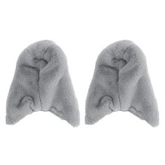 two pieces of grey sheepskin are shown in the shape of an animal's tail