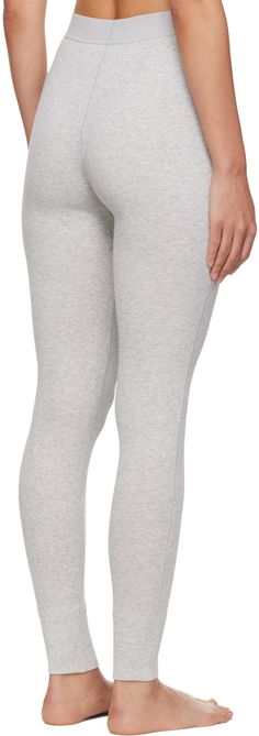 Rib knit stretch cotton leggings. · Textile logo patch at elasticized waistband · Partial jersey lining Supplier color: Light heather gray Textile Logo, Ribbed Leggings, Athletic Sports, Running Leggings, Yoga For Men, Cotton Leggings, Running Tights, Grey Cotton, Yoga Leggings