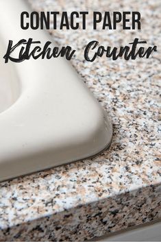 a kitchen counter with the words contact paper on it and an image of a sink