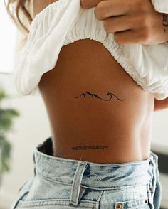 50 Best Small Travel Tattoos Ideas That Will Inspire Inner Wanderers | Unique & Cute Travel Tattoo Ideas Small Travel Tattoos, Piercing Arcade, Adventure Tattoo, 16 Tattoo, Tato Minimal, Travel Tattoos, Wave Tattoo, Tasteful Tattoos, Petite Tattoos