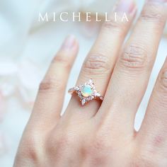 "Our current turnaround time for regular orders is 6-8 weeks. For urgent orders, please shop our Ready-to-Ship collection below (7-10 business days): https://michellia.com/collections/ready-to-ship (please copy and paste into browser) -------- 「Astrid」- Art Deco Petite Ring, in Ethiopian Fire Opal | R1007 A daintier sister of our signature \"Alessandra\" ring, \"Astrid\" is designed for those who prefer a more delicate profile without losing the elaborate art-deco inspired details. Despite its s 14k Rose Gold Halo Wedding Jewelry, 14k Rose Gold Halo Design Jewelry Gift, 14k Rose Gold Halo Jewelry For Wedding, Heirloom Style Rose Gold Opal Ring For Anniversary, Luxury Opal Ring With Accent Stones For Wedding, Luxury Opal Wedding Ring With Accent Stones, 14k Rose Gold Halo Jewelry Gift, Rose Gold Opal Ring With Accent Stones For Wedding, 14k Rose Gold Jewelry With Halo Setting For Gift