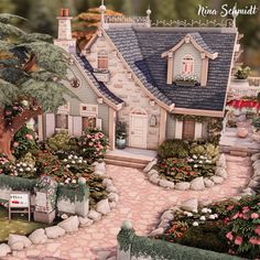 a house with flowers and bushes around it