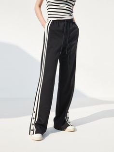 MO&Co. Women's Contrast Drawstring Waist Pants This Contrast Drawstring Waist Pants are perfect for a relaxed, stylish look. Crafted with an elastic drawstring waist and stripe contrast trim design, these pants also have a side slit with snap button closure details. Make these your go-to pair for a comfortable and fashionable style. Features : - Double side pockets- Elasticated drawstring waist- Side contrasting, slit with snap button details Code: MBD1PATT17The back length of size M is 106cmMAT Side Button Pants, Drawstring Waist Pants, Trim Design, Button Pants, Sport Style, Waist Pants, Contrast Trim, Sport Fashion, Snap Button