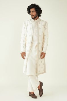 Off white sherwani highlighted with zari embroidered floral motifs. Comes with inner embroidered kurta and pant. - Aza Fashions White Sherwani, Mansions Interior, Kurta Set Men, Luxury Mansions, Kurta Set For Men, Groom Dress, Kurta Set, Floral Motifs