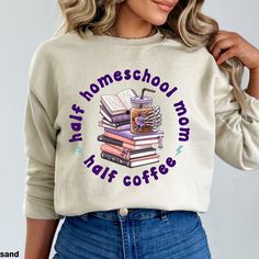 This adorable 'Half Homeschool Mom Half Coffee' print on a soft crewneck sweatshirt is super trendy and comfortable! These crewnecks are popular for their cozy, lived-in look and are a go-to choice for anyone seeking a comfortable, laid-back style 😊 ✨ SIZING AND HOW TO MEASURE ✨ Please see the size chart for reference. For accurate measurements, grab your favorite sweatshirt at home for comparison! Lay it flat on the floor and measure the length (highest point in collar down to very bottom) and width (armpit to armpit). Compare your measurements with our size chart to select the best size for you. → This is a normal-length unisex size sweatshirt. The model has tucked it in for styling purposes. → For the trendy oversized look, we recommend selecting 1-2 sizes ABOVE your normal size! ✨ PRO Casual Graphic Print Sweatshirt For School, Casual Crew Neck Sweatshirt For School, Cotton College Style Sweatshirt For School, Casual Relaxed Fit Sweatshirt For School, School Crew Neck Sweatshirt With Graphic Print, Long Sleeve Sweatshirt With Text Print For School, Casual Long Sleeve Tops For Back To School, College Style Letter Print Sweatshirt For School, Long Sleeve T-shirt For College Back To School