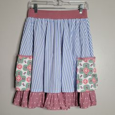 Nwt Condition. Please See All Photos Before Purchasing, This Item Has Hanger Clip Marks On The Waist. This May Come Out In First Wash. Waist: Approximately 13 1/4" Length: Approximately 21 1/2" Bundle & Save With Other Size Nwt Medium Matilda Skirt For A 30% Off Offer To Be Sent!! :) Playful Blue Cotton Skirt, Pink Cotton Skirt With Pockets, Playful Pink Lined Skirt, Playful Blue Skirt For Spring, Cute Blue Tiered Skirt Bottoms, Cute Blue Tiered Skirt, Hanger Clips, Matilda Jane, Matilda