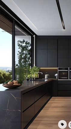 an image of a modern kitchen setting with wood flooring and black cabinetry on the walls