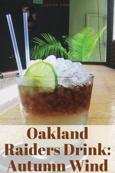 a drink in a glass with ice and lime on the rim that says oakland radlers drink autumn wind