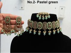 * Light Weight Antique gold choker necklace Set with earrings tikka as shown in the pic. * Studded with crystals and rhinestones. * One of a Kind. *Necklace Width- 1.6 inches(included drops) * Earrings Length: 2.8 inches(included drops) *Earrings width- 1.1 inches Green Choker For Diwali Party, Green Choker For Diwali Celebration, Diwali Celebration Green Choker, Green Chandbali Choker For Parties, Green Meenakari Choker For Party, Green Bollywood Choker For Celebration, Green Choker For Party Festivals, Green Choker For Party And Festivals, Gold Choker Necklace Set