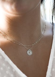 · 1/2" (12.7mm) disc· 14k yellow gold fill, 14k rose gold fill, and sterling silver options· Sturdy, timeless, and built to be worn everydayOur classic 1/2” necklaces are easy to layer, elegant, and ready to be personalized with your most special sentiments, moments, and memories! Created to last a lifetime, these necklaces will remain evergreen even as the years and trends come and go.Personalizing your piece with a message? Reference our fonts and symbols chart for font options and character m Fonts And Symbols, Disc Necklace, Classic Gold, Gold Filled, Silver Necklace, 14k Gold, Yellow Gold, Rose Gold, Necklaces