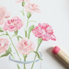 a drawing of pink flowers in a vase with a crayon marker next to it