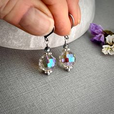 "✦These crystal dangle earrings have beautiful iridescent rainbow reflections and are perfect as a gift for the bridesmaids, to wear to the prom or any special dressy occasion!   ✦Clear, colorless Aurora borealis multi-faceted Swarovski crystal round beads dangle from stainless steel round style leverback ear wires.   ✦Crystal size is 10mm in diameter and total length 1 - 1/4 inches, including ear wires.   ✦Your jewelry will be packaged in a beautiful and reusable organza bag. All items will be Diy Jewelry Projects, The Prom, Iridescent Crystal, Ball Drop, Crystal Dangle Earrings, Jewelry Bridal, Leverback Earrings, Jewelry Card, Wedding Jewelry Earrings