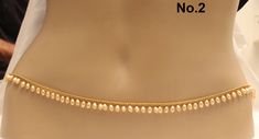 * Beautifully designed gold color belly chain. * can be used with belly dance costumes and saris. * D.no.1- Gold Belly chain high quality. Adjustable from 25 to 40 inches Waist. * D.no.2- Gold Belly chain high quality Adjustable from 25 to 40 inches Waist. *D.no.3- belly chain Adjustable from 25 to 40 inches waist. Bohemian Gold Beads Waist Chain For Festivals, Bohemian Gold Waist Chain For Festivals, Gold Pearl Chain Body Chain For Festival, Bohemian Gold Waist Beads For Festival, Bohemian Gold Body Chain For Wedding, South Indian Saree, Nath Bridal, Indian Nose Ring, South Indian Sarees