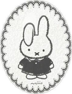 a black and white drawing of a rabbit on a doily with the word bunny in it