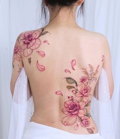 a woman with flowers on her back