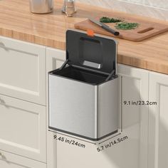 a kitchen counter with a cutting board and knife holder on the wall next to it