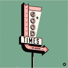 a neon sign that says good times up ahead on top of a green background with the words good times above it