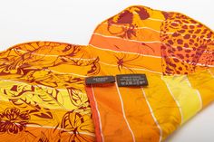 Hermes limited edition mini heart Dallet "ghepards" scarf. Comes in original box. Hermes Limited Edition, Faux Hide Rug, Mini Scarf, Jungle Love, Hermes Orange, Chinoiserie Wall, Orange Scarf, Hide Rug, Cocktail Ottoman