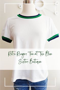 This cream white tee has a cool retro vibe, has ribbed navy and green contrast on the neck and sleeves, and a cute little puff on the shoulder. 100% cotton. Runs small; we recommend sizing up. Ringer Tee, White Tee, Navy And Green, Retro Vibe, Cream White