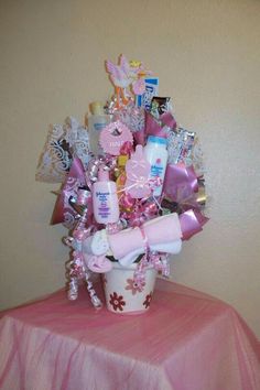 a baby shower gift basket on a table