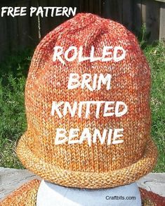 a knitted hat with the words rolled brim knitted beanie written on it