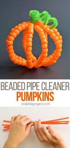 an orange pipe cleaner pumpkin made out of plastic pipes