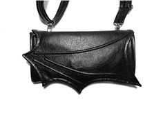 Black Wallet clutch, Necessary clutch wallet, Accordion wallet, Bat wing, Vegan wallet, Women Wallet, Bat wallet, Removable strap, black, red, purple... PLEASE NOTE all monitors display colors differently. Unusual wallet - made of high-quality faux leather that looks like real leather. Original design Handmade Removable strap 6 credit card holder 2 center pockets (cell phone, keys...) 1 zippered pocket 2 cash pockets size: 21 x 11 cm 8.2 x 4.3 inch Velcro is the only way to close flap without ru Black Crossbody Clutch With Card Slots, Necessary Clutch Wallet, Accordion Wallet, Vegan Wallet, Bat Wing, Women Wallet, Best Wallet, Pocket Wallet, Black Wallet