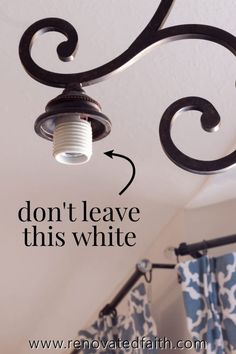 a light fixture with the words don't leave this white on it and an arrow pointing