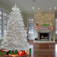 a white christmas tree in a living room