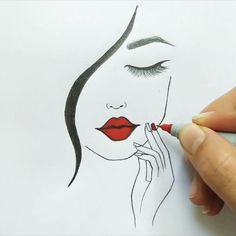 a drawing of a woman's face with red lipstick