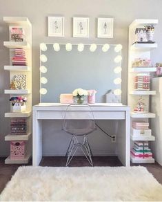 a white desk sitting in front of a mirror