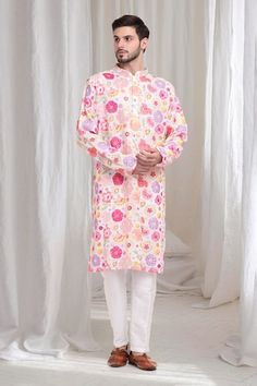 Cream cotton kurta with pink floral thread and mirror work embroidery. Paired with solid pant. - Aza Fashions Spring Cotton Traditional Wear With Mirror Work, Spring Traditional Cotton Wear With Mirror Work, Spring Traditional Wear With Mirror Work, Pink Bollywood Sherwani With Floral Embroidery, Cotton Sherwani With Dabka Work For Spring, Pink Sherwani With Mirror Work In Straight Kurta Style, Bollywood Style Sherwani With Dabka Work For Spring, Pink Sherwani With Mirror Work, Pink Cotton Sherwani With Resham Embroidery