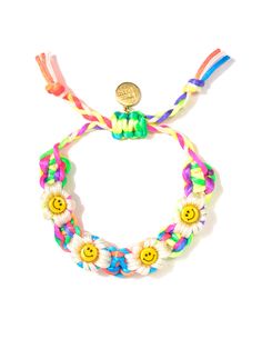 Spread the sunshine with our Rainbow Daisy Bracelet featuring smiley flowers. With its bright colors and cheerful design, it's sure to brighten up any outfit — and your mood. 6" Adjustable rainbow threadwork Drawstring closure (extendable up to 8") Gold plated brass hardware Ceramic Charms Handmade in New York City and Puerto Rico. Due to the handmade nature of our products, some charms may vary in color and style or be replaced if unavailable. Please allow 5-7 business days for production. Rainbow Daisy, Ceramic Charms, Wedding Atelier, Daisy Bracelet, Craft Corner, Shell Bracelet, Silver Shop, Unique Engagement, The Sunshine