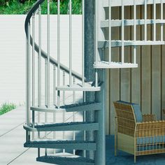 a set of stairs next to a wicker chair