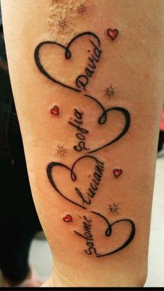 a woman's thigh with two hearts and the words i love you in cursive