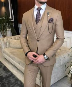 This is a Classy Brown color 3 Piece Suit by fixashop /crafted from high quality fabric and imported materials. Our products are handcrafted by experienced tailors who make sure the that the stitching is precise, lining is proper and the overall product is sturdy enough to not go out of shape for more than a few years. Also all our products have extra margins in their length, sleeves, sides so it's easily alterable if your size changes after some time. To see more available colours and designs in this collection, Check out the ' Collection' Section. *This is a 3 piece set of a Coat+westcoast+pant  *We also offer customization so we can provide you an even better fit if you massage us your measurements (in inches) of Chest, Stomach, Waist, Hip, Shoulder and Actual Height after ordering. *Wa Brown Slim Fit Sets For Semi-formal Occasions, Brown Tuxedo Suit For Wedding, Brown Three-piece Suit With Notch Lapel For Wedding, Brown Tuxedo Suit For Groom, Brown Three-piece Suit For Groom With Suit Collar, Brown Three-piece Suit With Suit Collar For Groom, Brown Notch Lapel Three-piece Suit For Wedding, Fitted Brown Double Breasted Suit For Wedding, Fitted Brown Double Breasted Wedding Suit